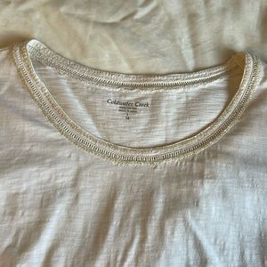 Tunic with beaded neckline